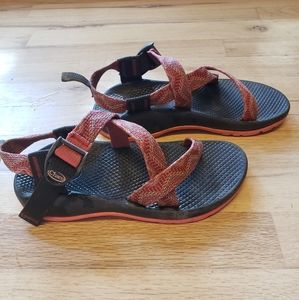 Salmon and pink colored kids chaco's water shoes